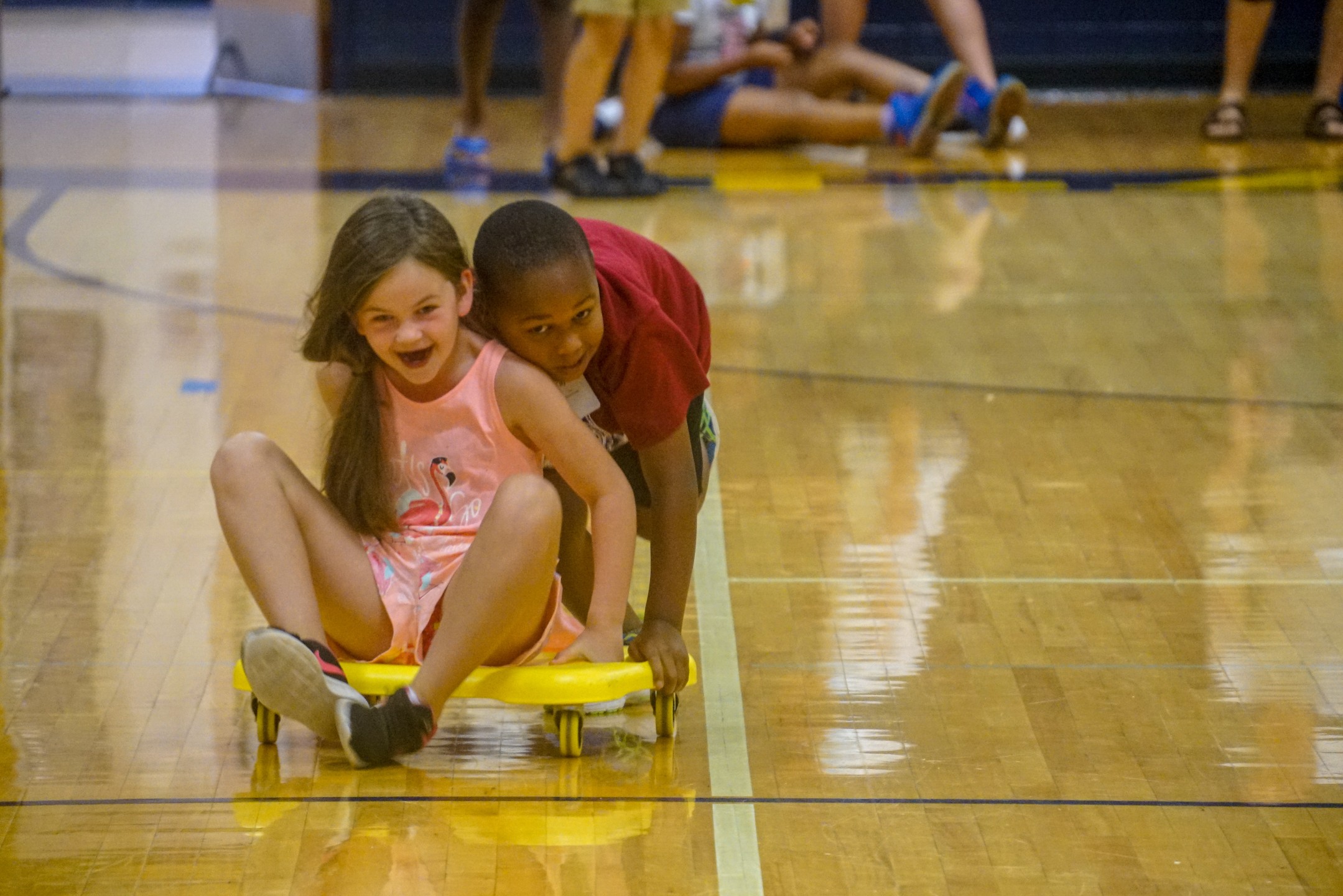 Boy playing cornhole