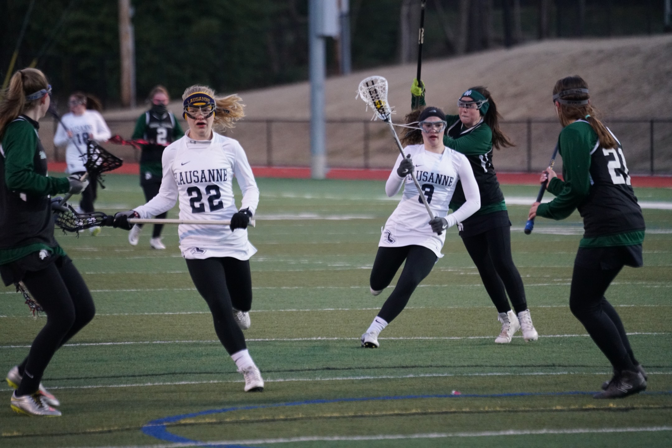 Group of girl’s lacrosse players during a game