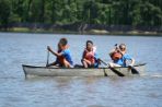 Students canoeing on lake